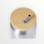 Persopens reusable silver metal soda can tumbler with a bamboo lid and stainless steel straw, top-down view.